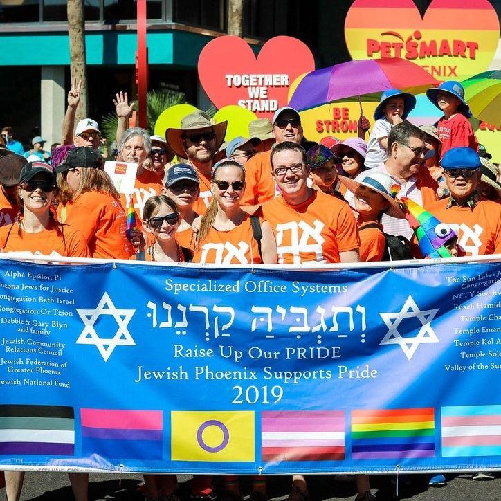 Image of a group of marchers in a pride parade